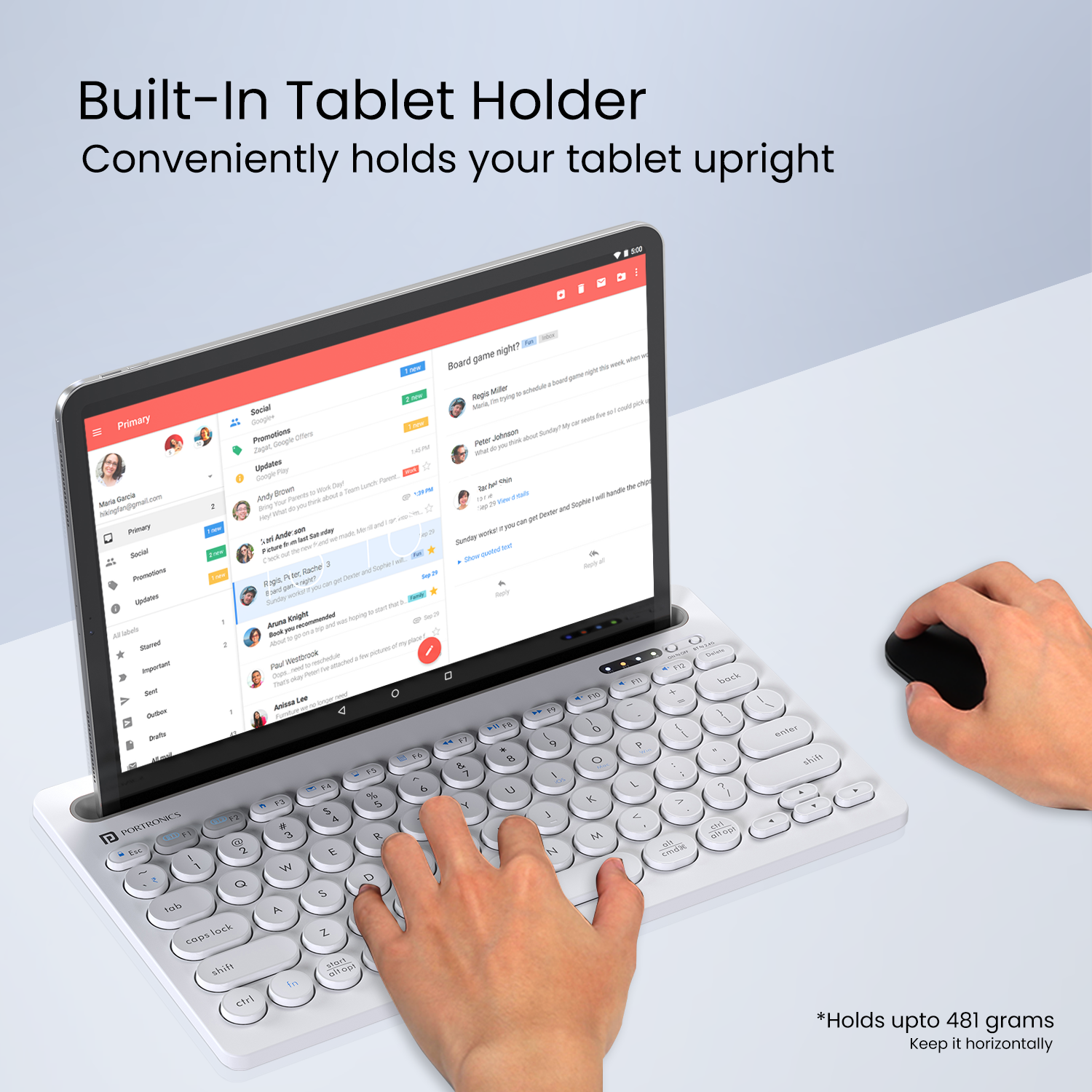 White Bubble Dock computer keyboard with a rechargeable battery with a built-in holder slot for added convenience
