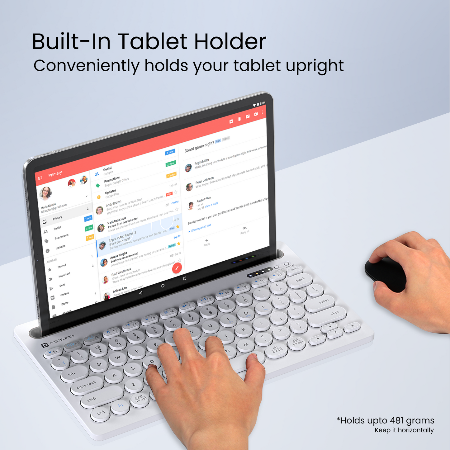 White Bubble Dock computer keyboard with a rechargeable battery with a built-in holder slot for added convenience
