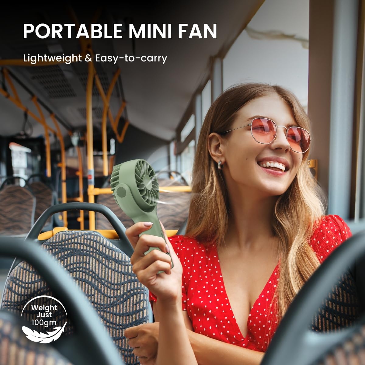 Green Toofan Mini portable hand fan with user-friendly power button to switch between low, medium, and high cooling modes effortlessly