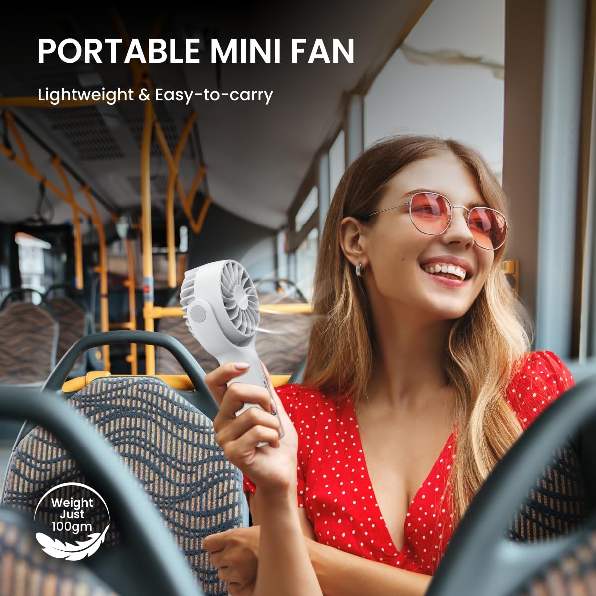 White Lightweight Toofan Mini portable mini fan weighing just 100 grams, designed for kids, travelers, and professionals needing fast relief from heat