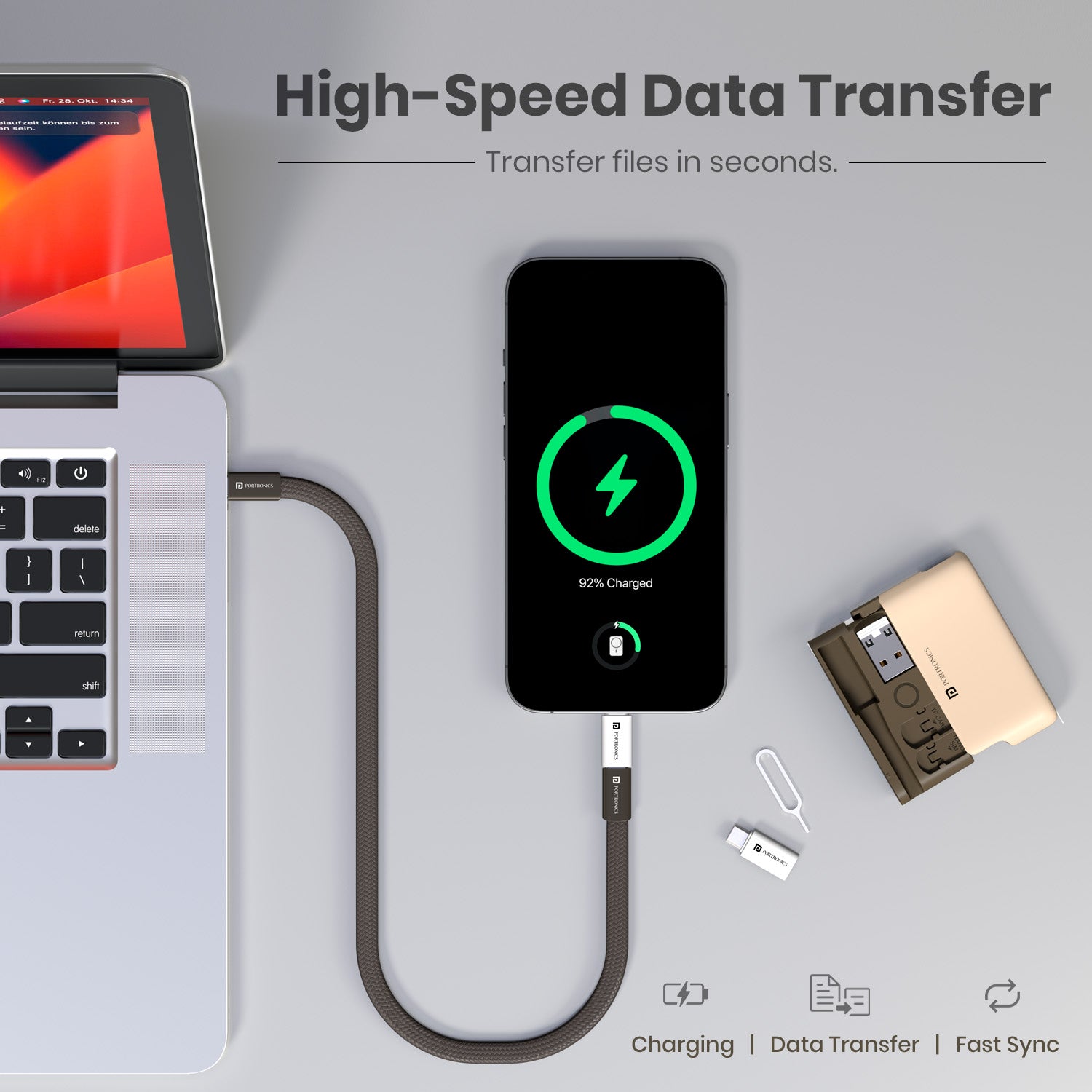 Beige portronics snapcase ultra type-c data cable from vibrant kit connected to laptop for fast sync | high-speed file transfer cable for documents music and photos | usb c cable supporting simultaneous data transfer and fast charging | data transfer cable for laptop and phone