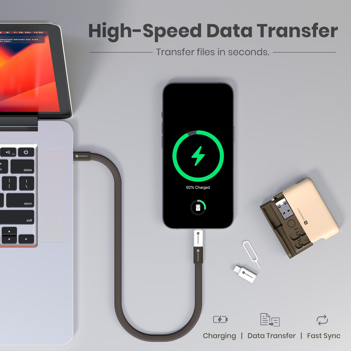 Beige portronics snapcase ultra type-c data cable from vibrant kit connected to laptop for fast sync | high-speed file transfer cable for documents music and photos | usb c cable supporting simultaneous data transfer and fast charging | data transfer cable for laptop and phone